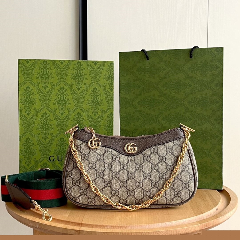G*u*i top handle bags